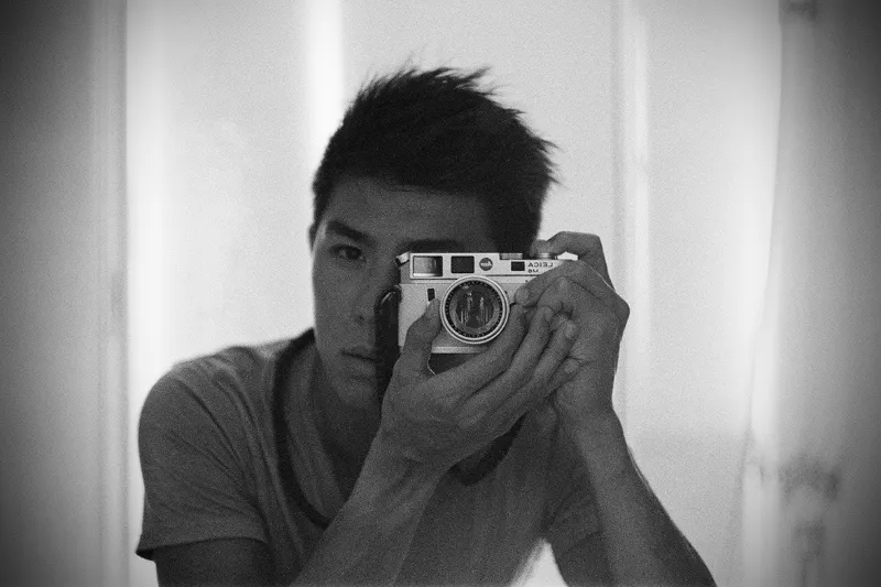 Jimmy JL, self-portrait with a rangefinder camera